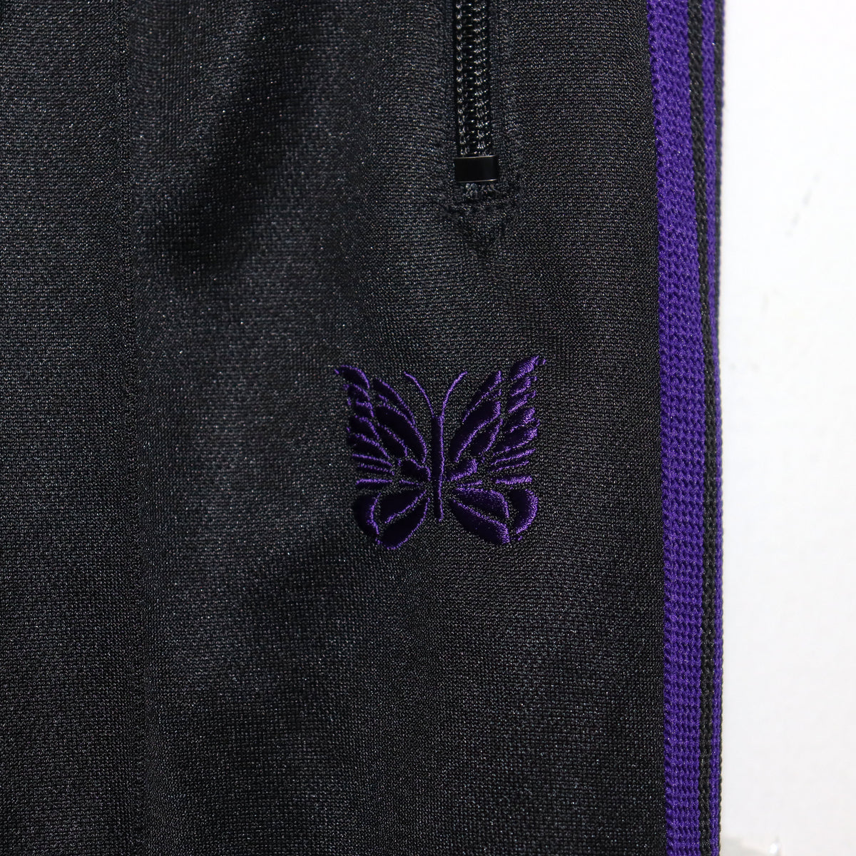 Needles : Track Pant - Poly Smooth 【BLACK×PURPLE】